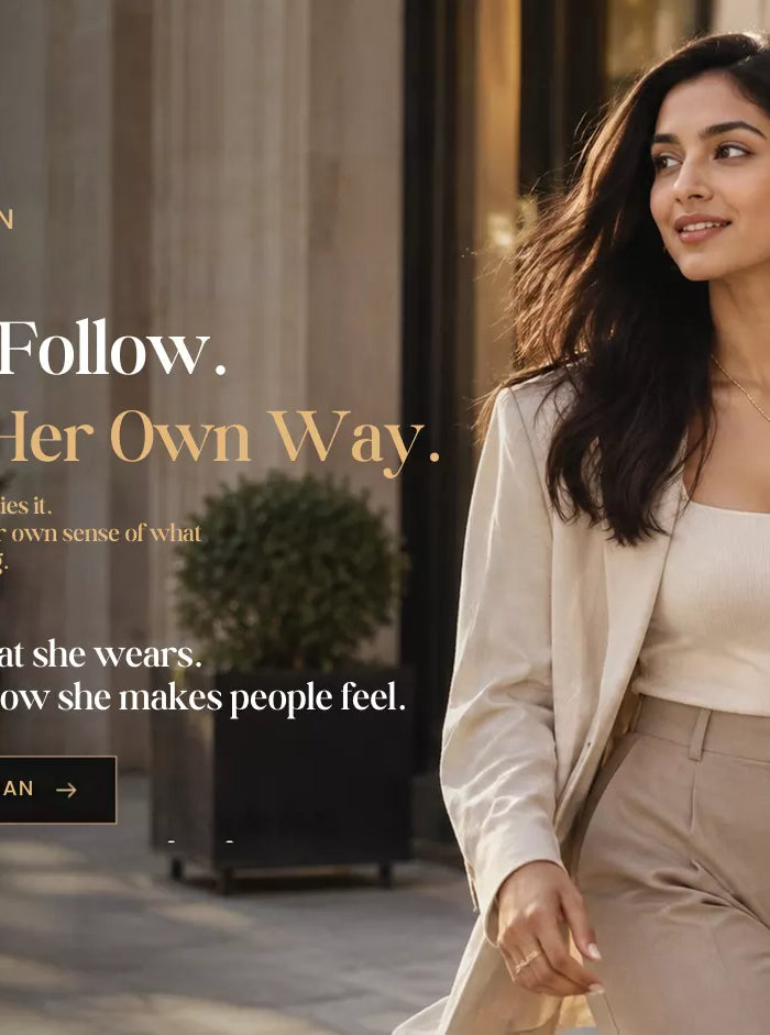 Confident woman in elegant neutral attire wearing Mitrava jewellery, representing the modern Mitrava woman.